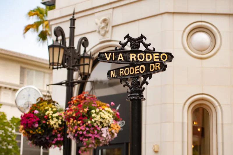 The Rodeo Drive street sign in Beverly Hills, a short walk from Dr. Cat Plastic Surgery